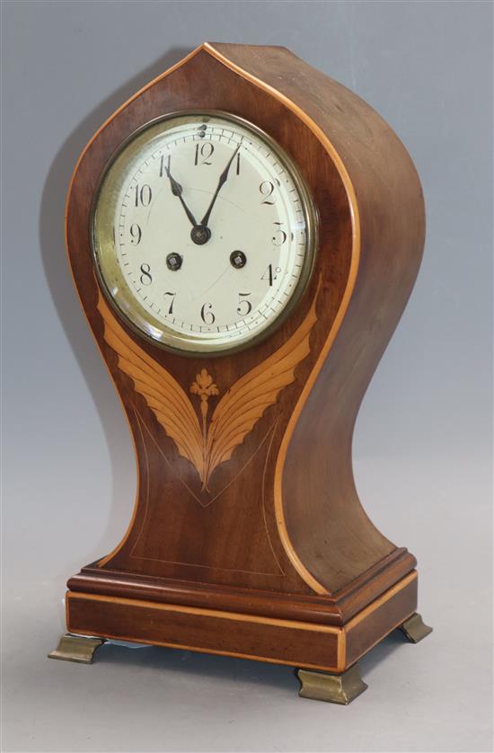 An Edwardian walnut inlaid balloon mantel clock height 34cm